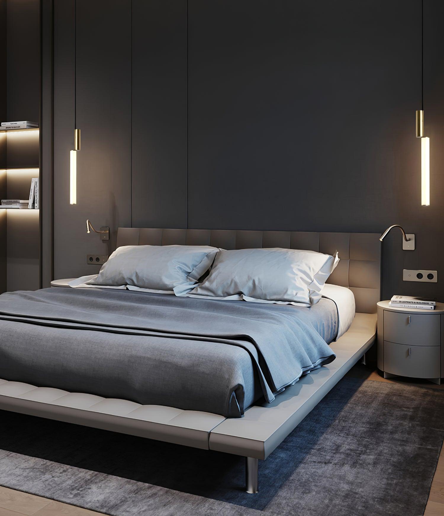 Separate Gold pendants in a bedside arrangement