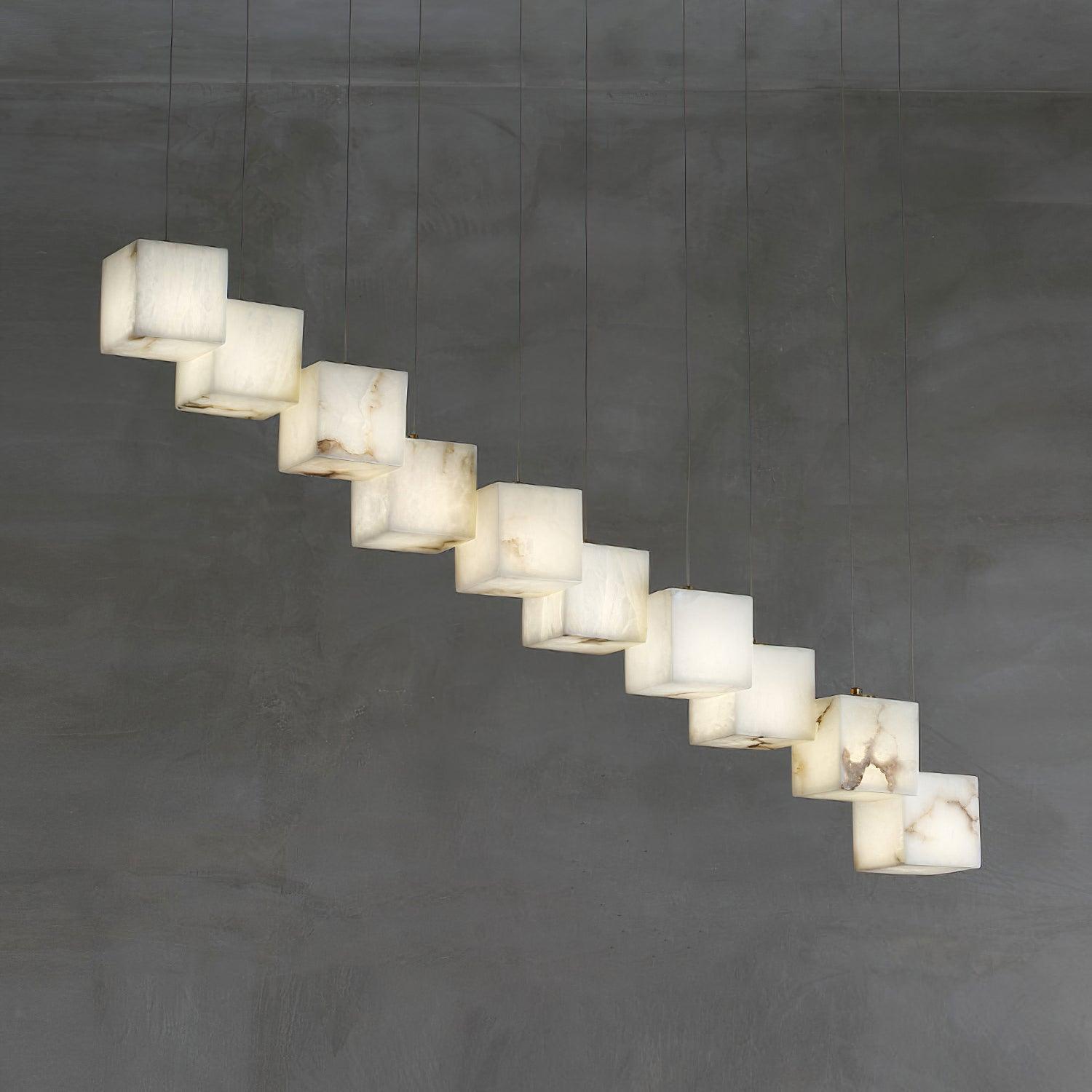 Long staggered row of illuminated white cube shades against a gray background