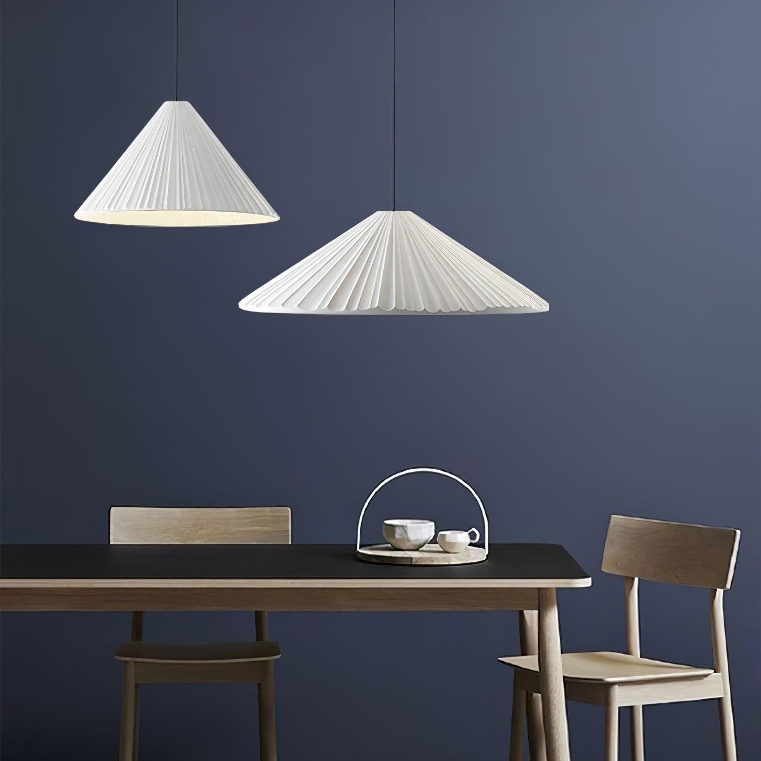 White Hat pendants above a dining table