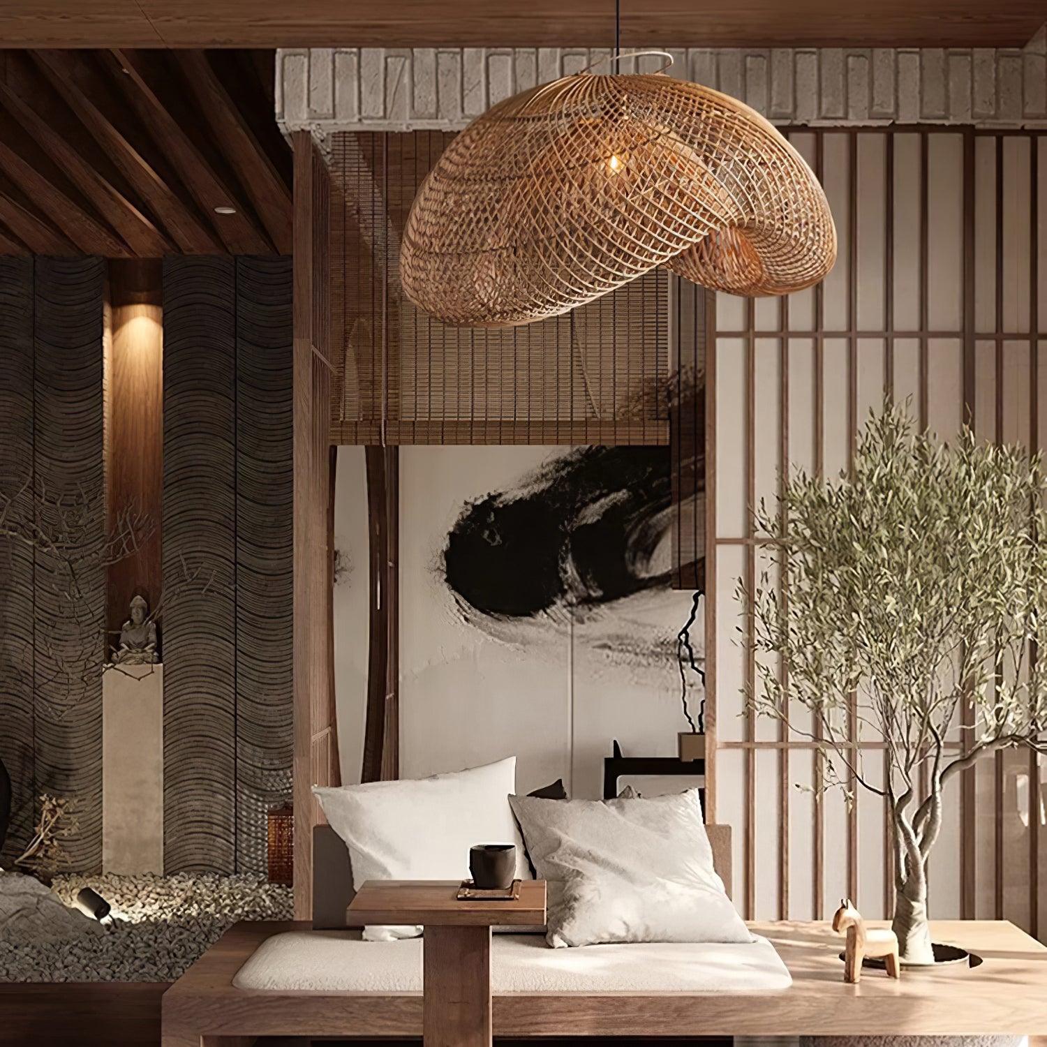 Woven wave pendant in a wood-framed seating alcove with white cushions, tea cup, tree and brushstroke artwork