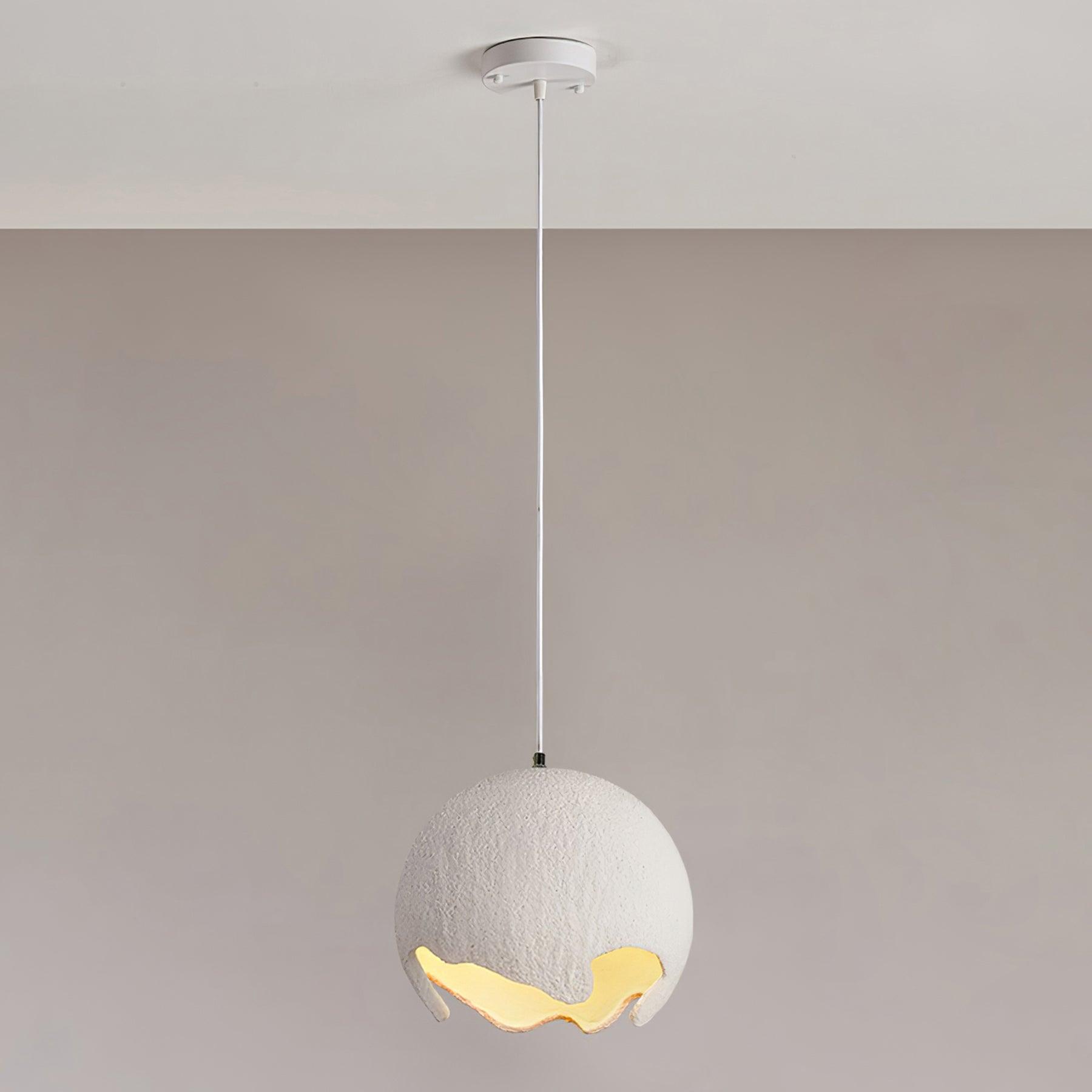 Large white textured pendant with a glowing lower opening