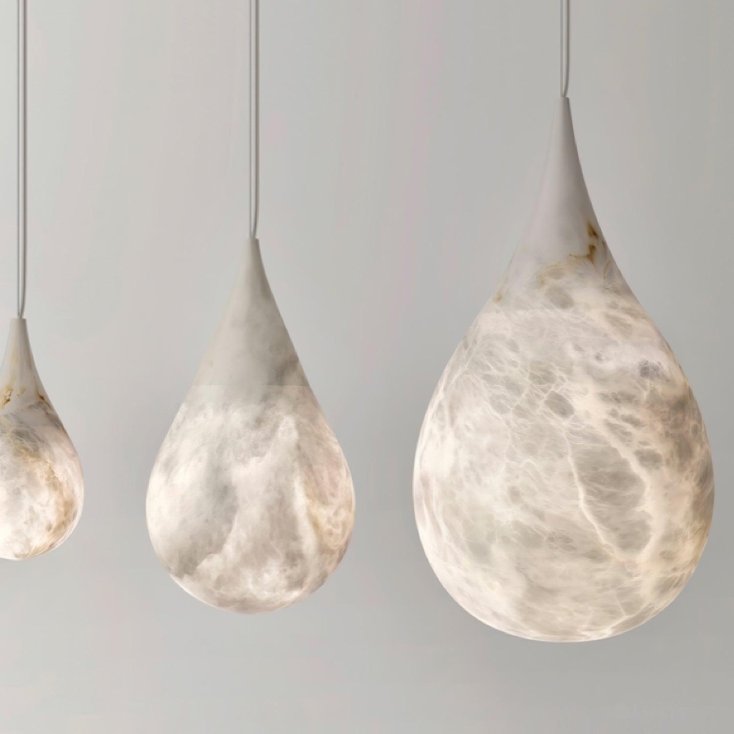 Three marble droplet forms shown at different scales