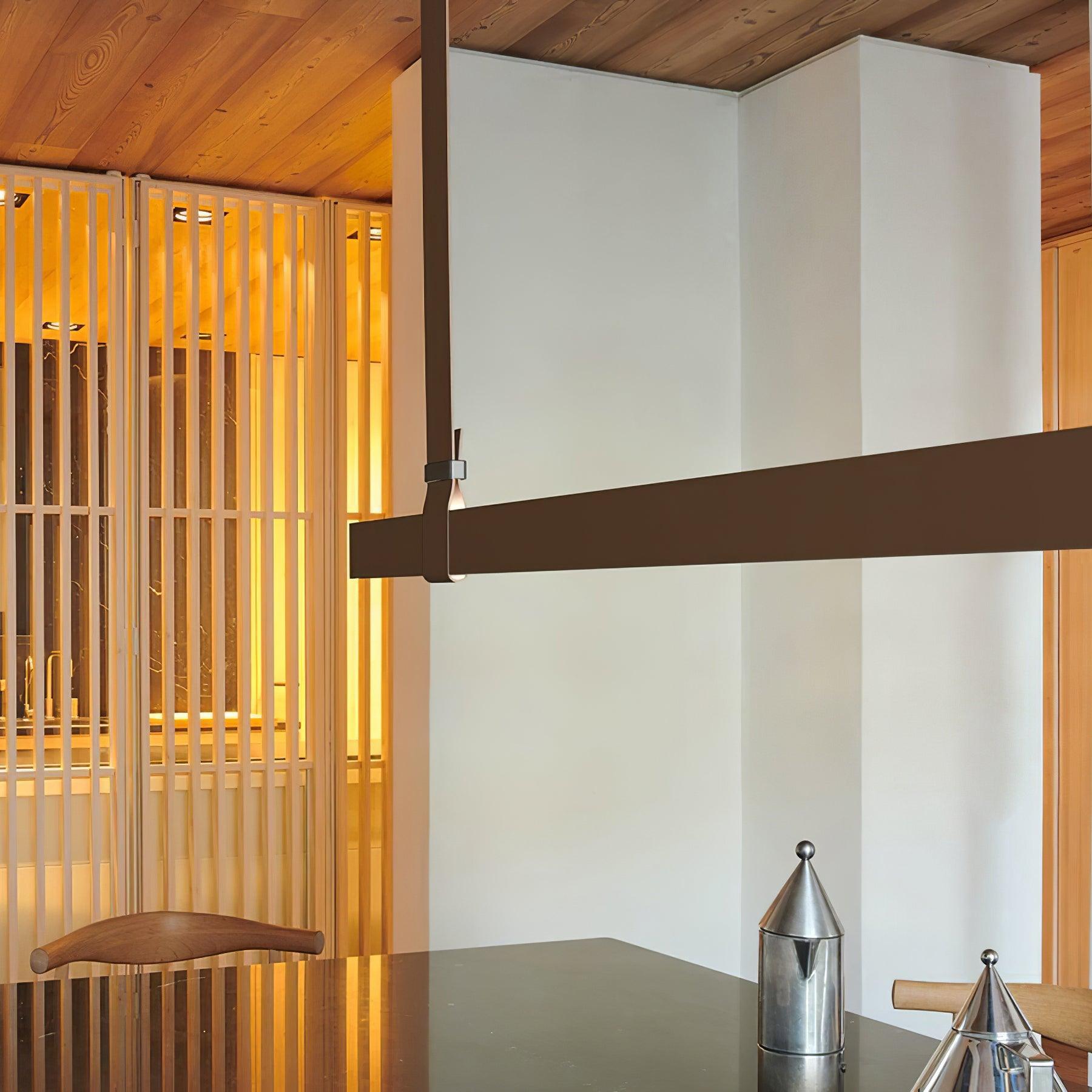 Close view of brown strap and horizontal bar