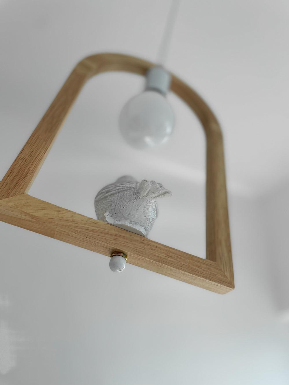 Underside view of bird figure and arch