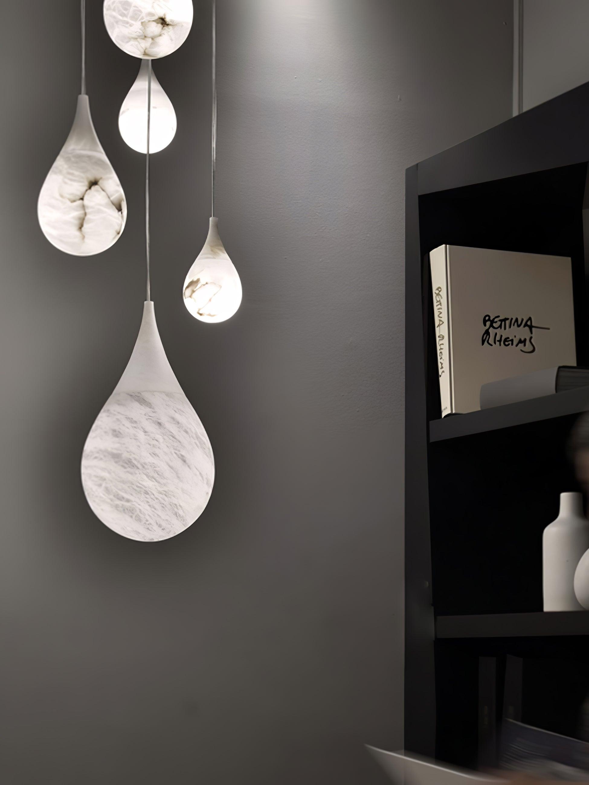 Marble pendants arranged beside shelving