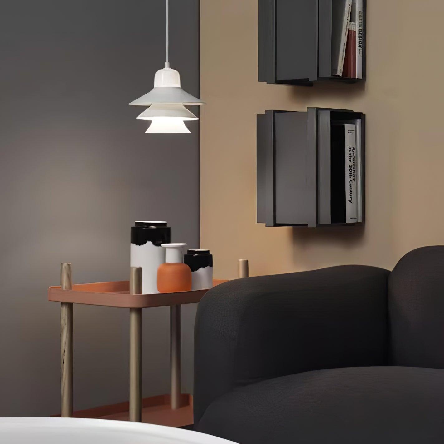 White pendant above a side table