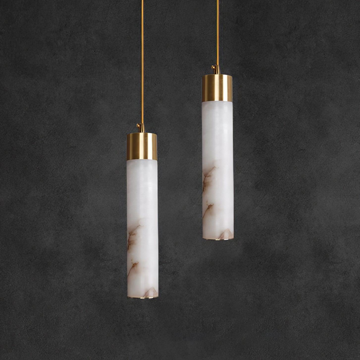Two unlit White Alabaster tubes on gold-coloured cords