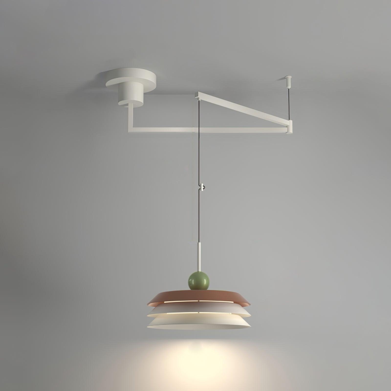 Red-top three-tier Morandi pendant with white lower tiers on a white ceiling swing arm