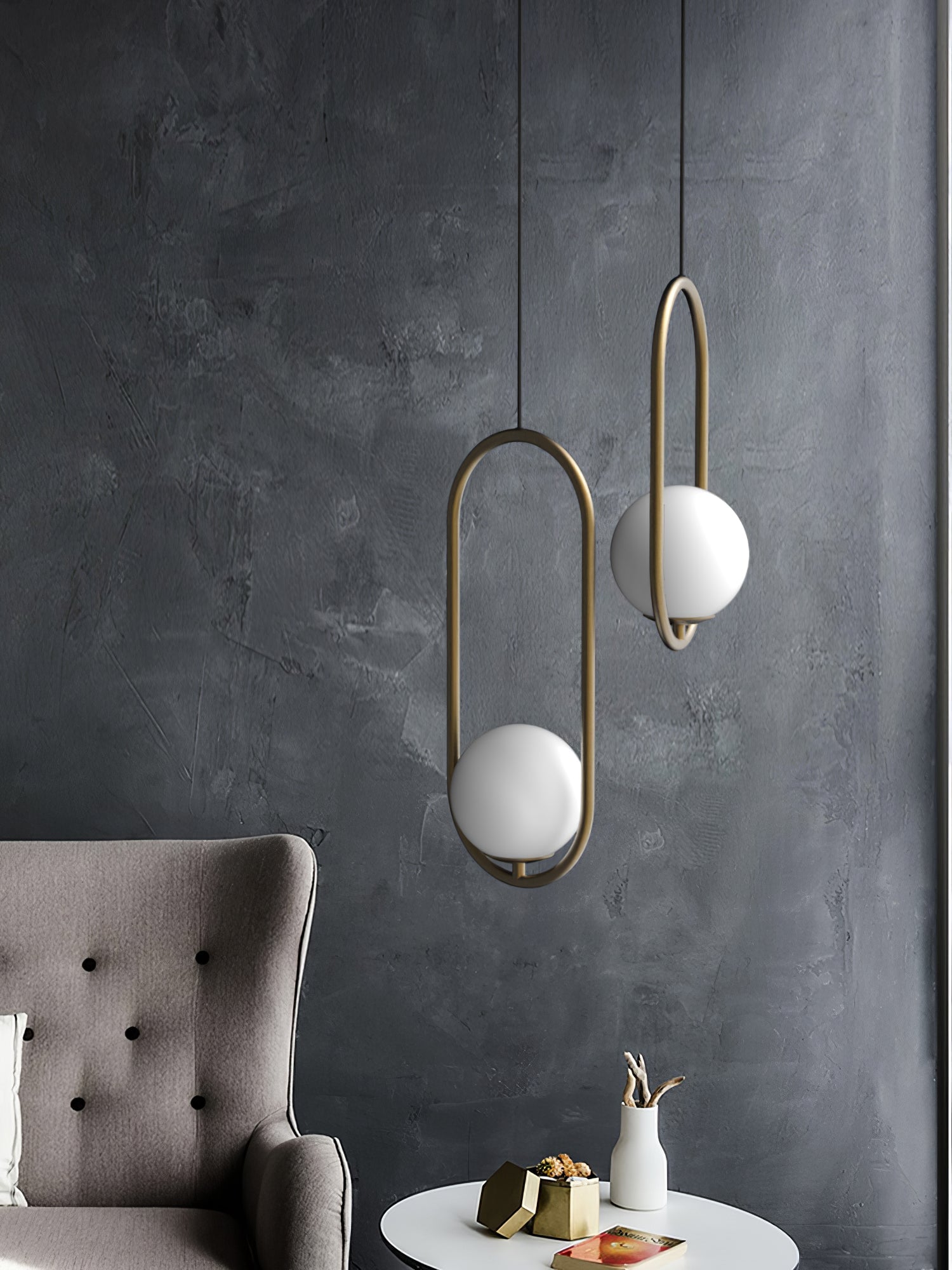 Oval frame lights against a textured grey wall
