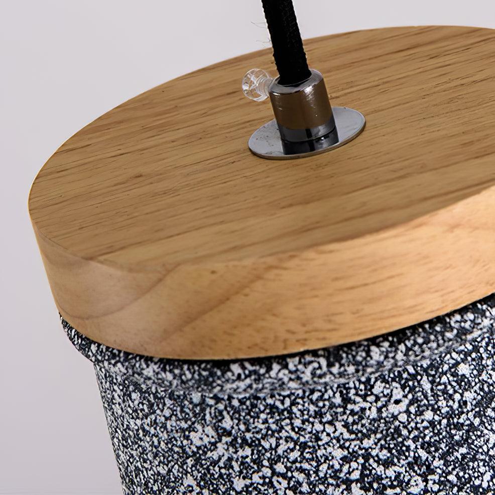 Close view of wooden top and cable fastener