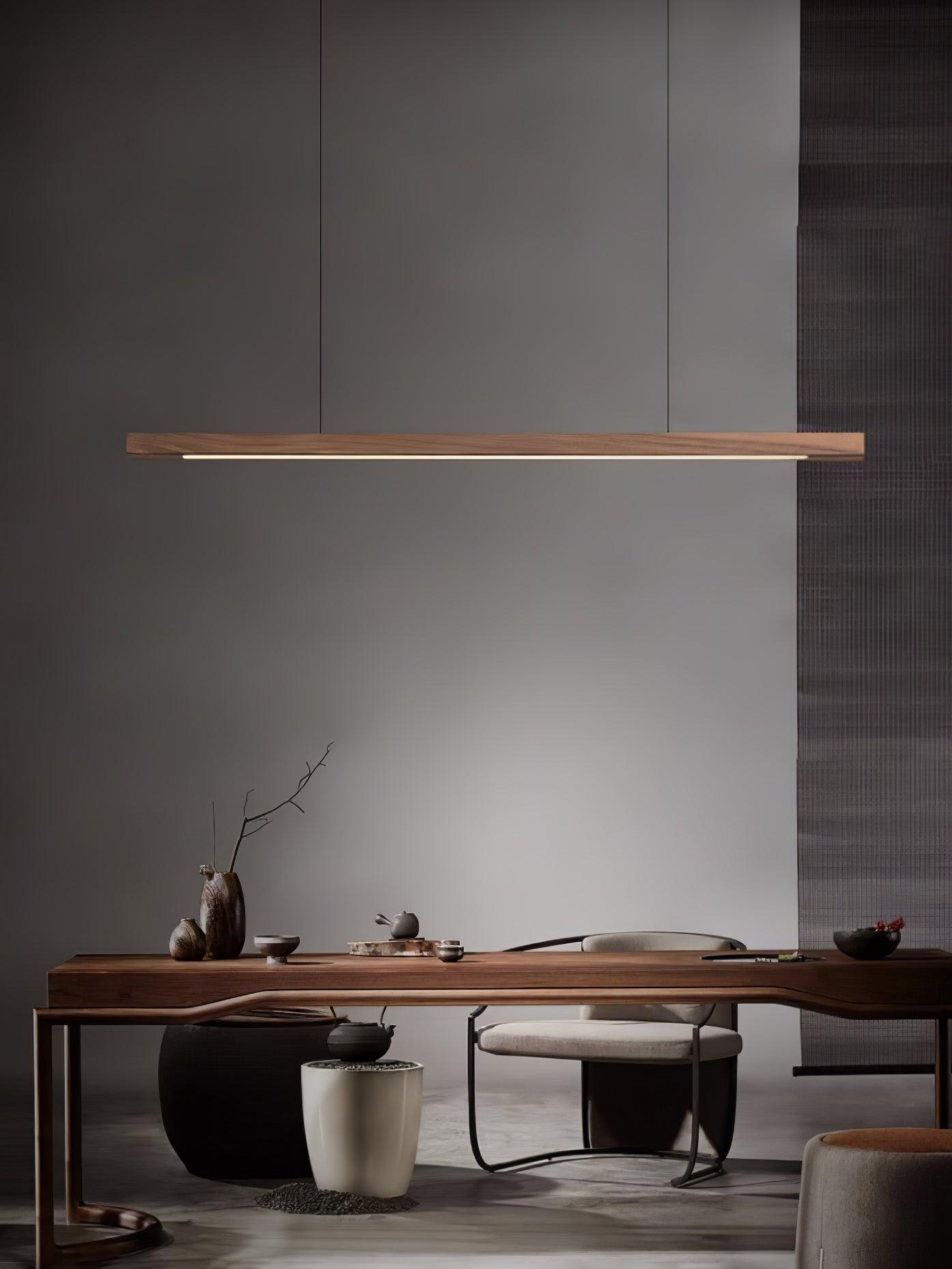 Walnut-colour pendant above a long desk