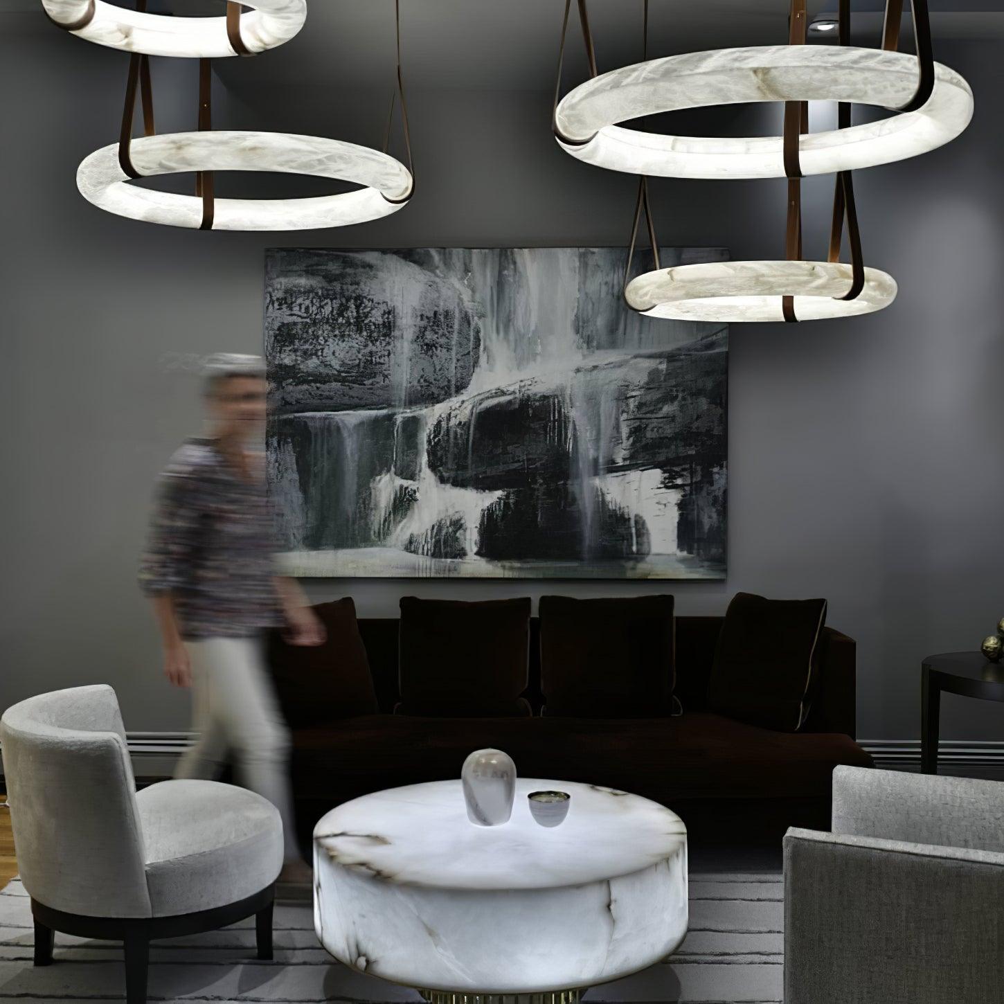 Multiple ring pendants in a lounge