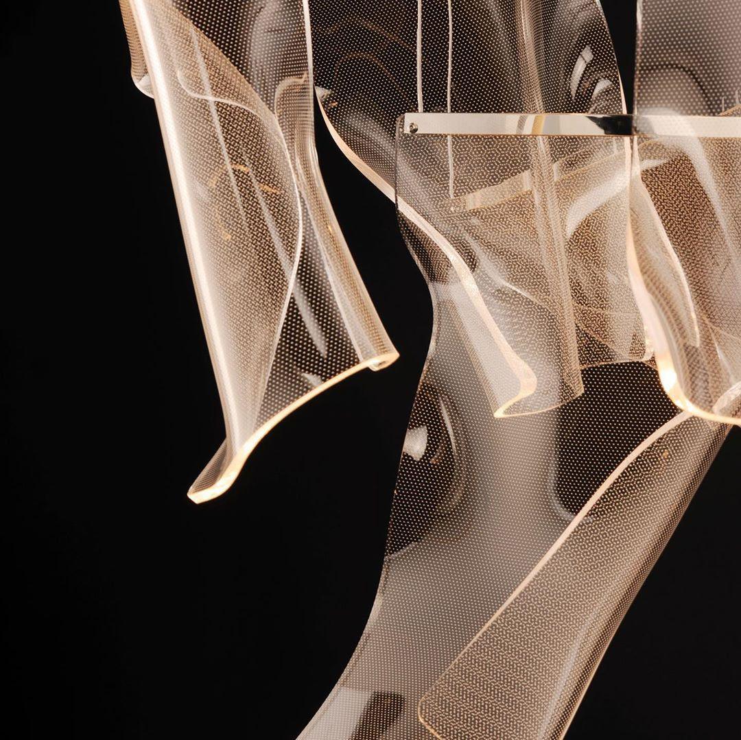 Warm-lit edges and dotted texture of acrylic sheets