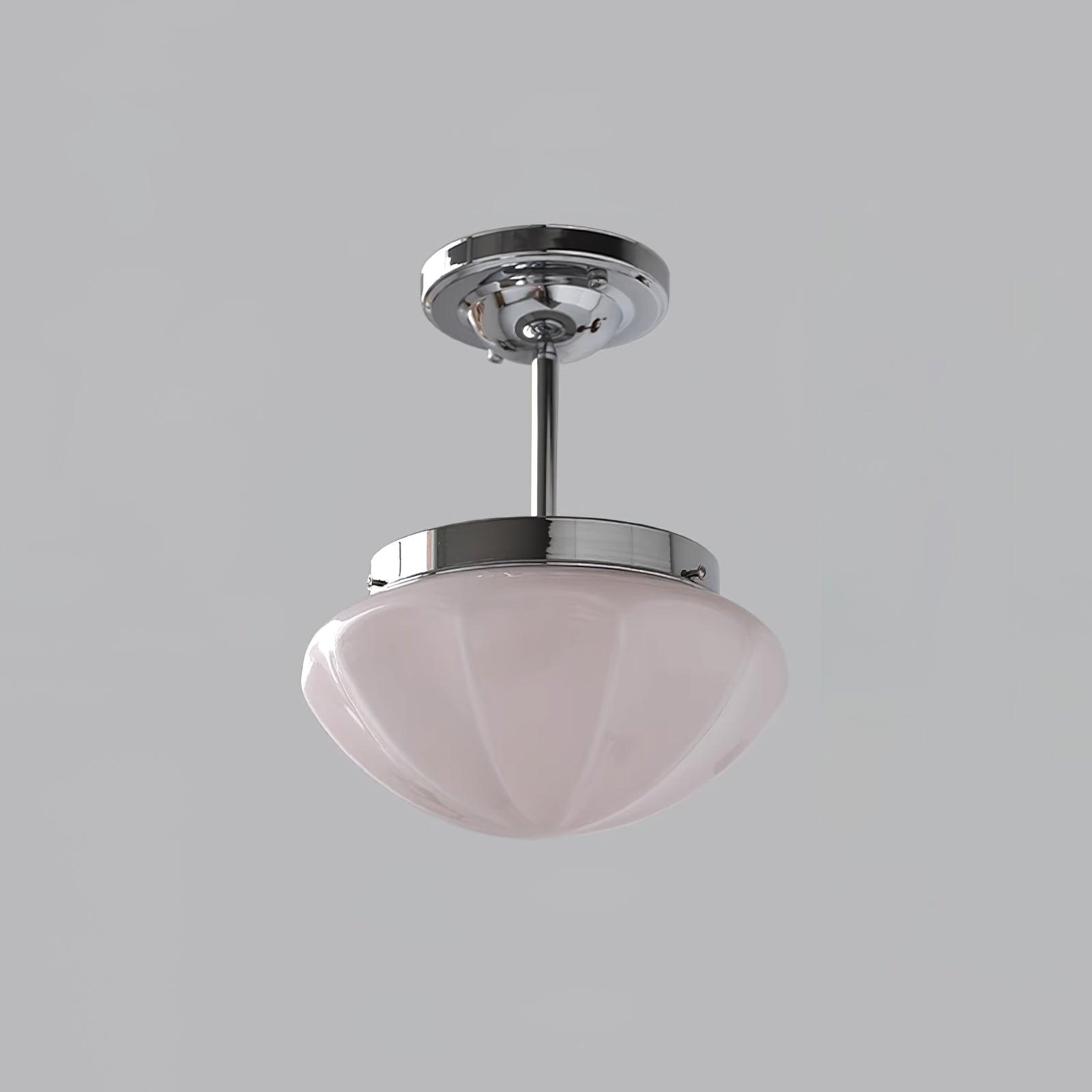 Pink faceted glass ceiling light with a silver cap and longer stem