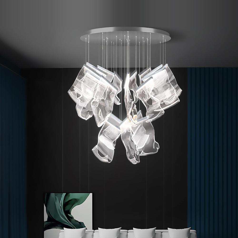 Illuminated acrylic cascade against a dark wall
