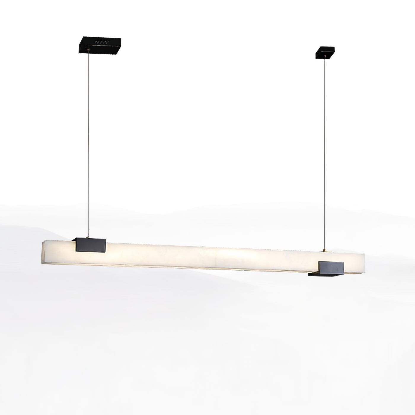 Front view of white pendant bar with black fittings, thin cables and unequal rectangular ceiling canopies