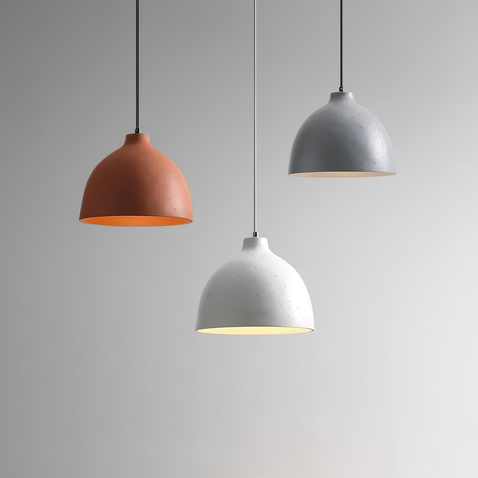 Close grouping of orange grey and white pendants