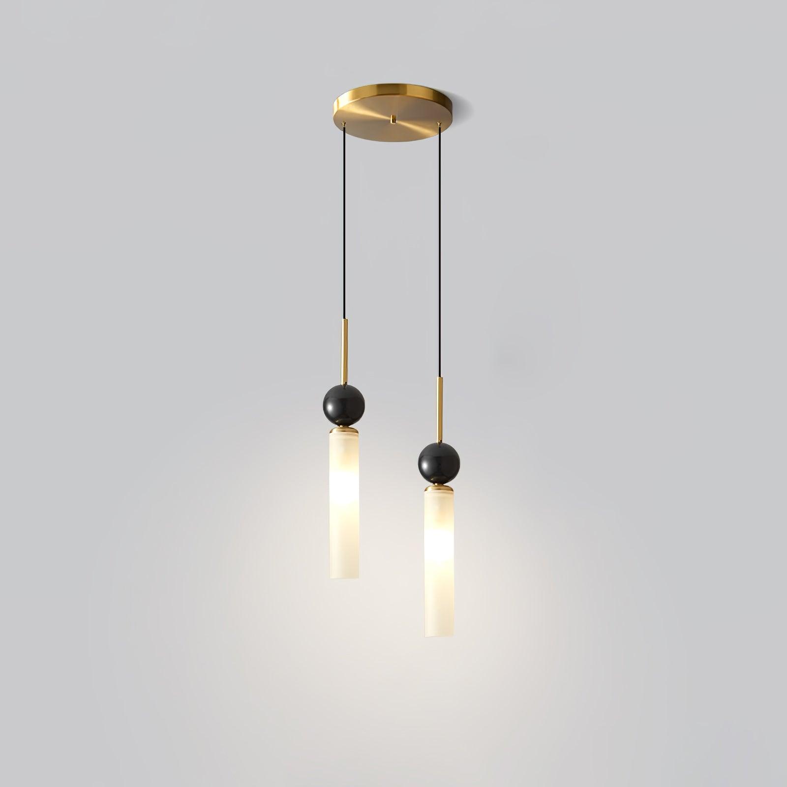 Two-head Brass & White option, with shared round brass-tone canopy, dark spheres and staggered glowing white tubes