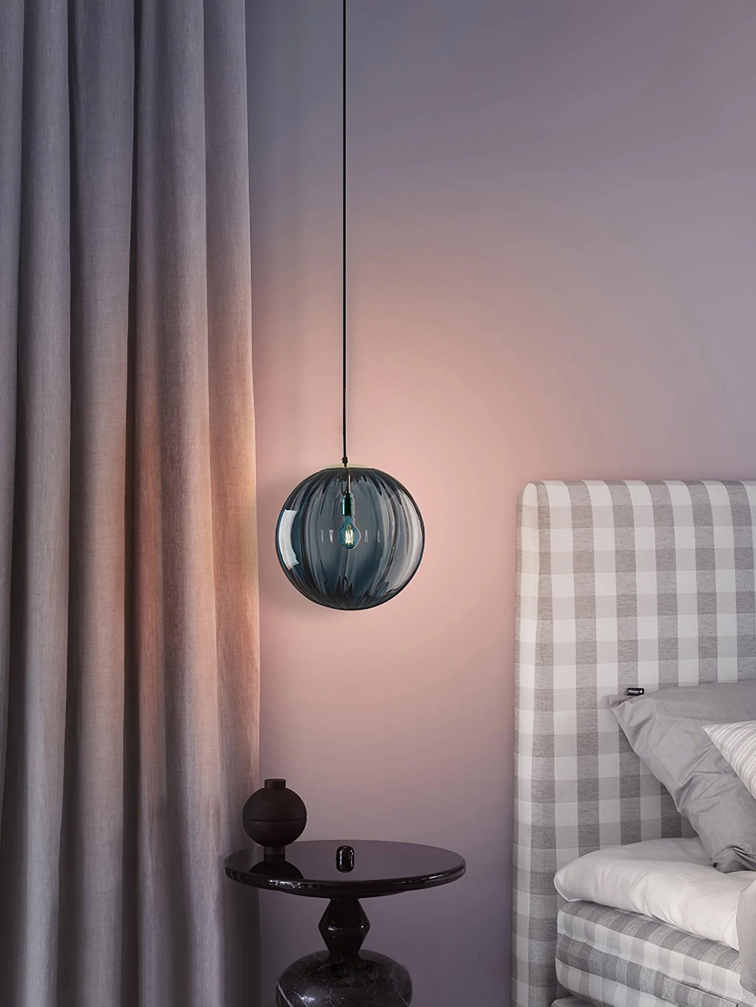Paola pendant light with a coloured glass globe and small metal cap