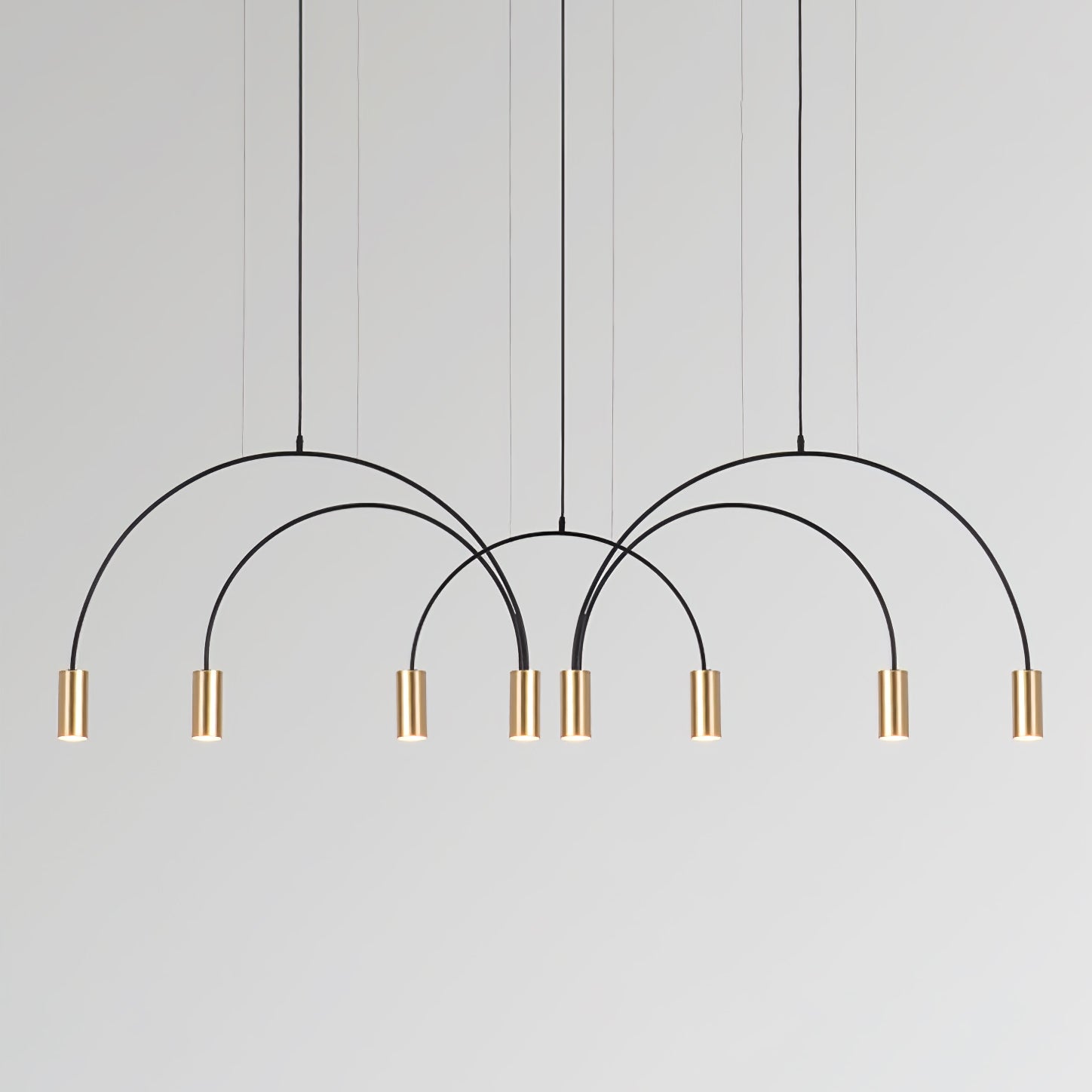 Gold-tipped overlapping arcs on a pale background