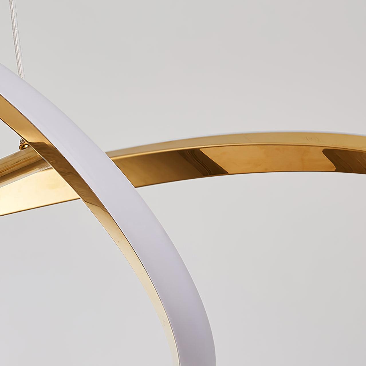Close-up of an unlit pale strip along a reflective gold ribbon at the crossing point