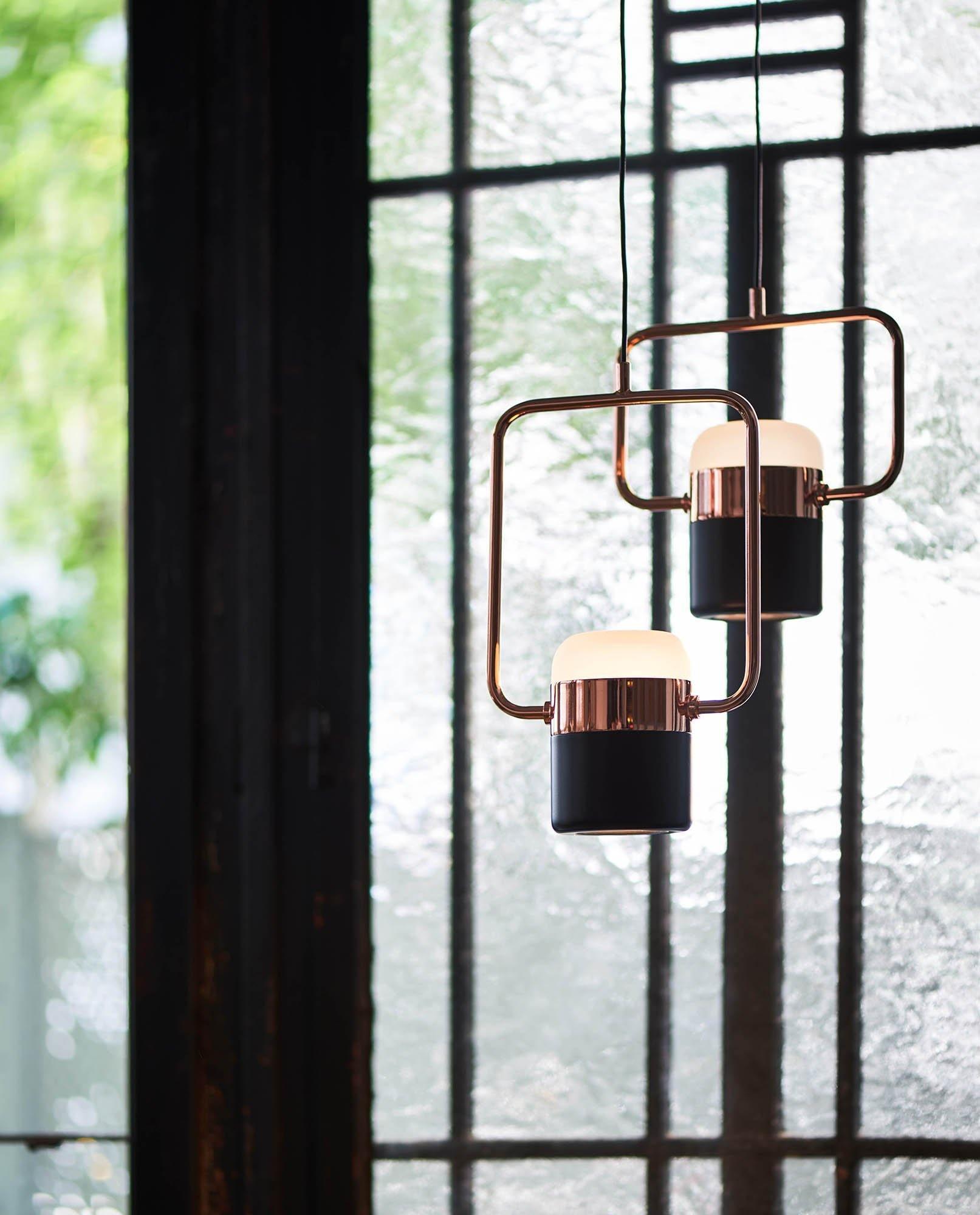 Geometric LED pendant light with adjustable cylindrical heads