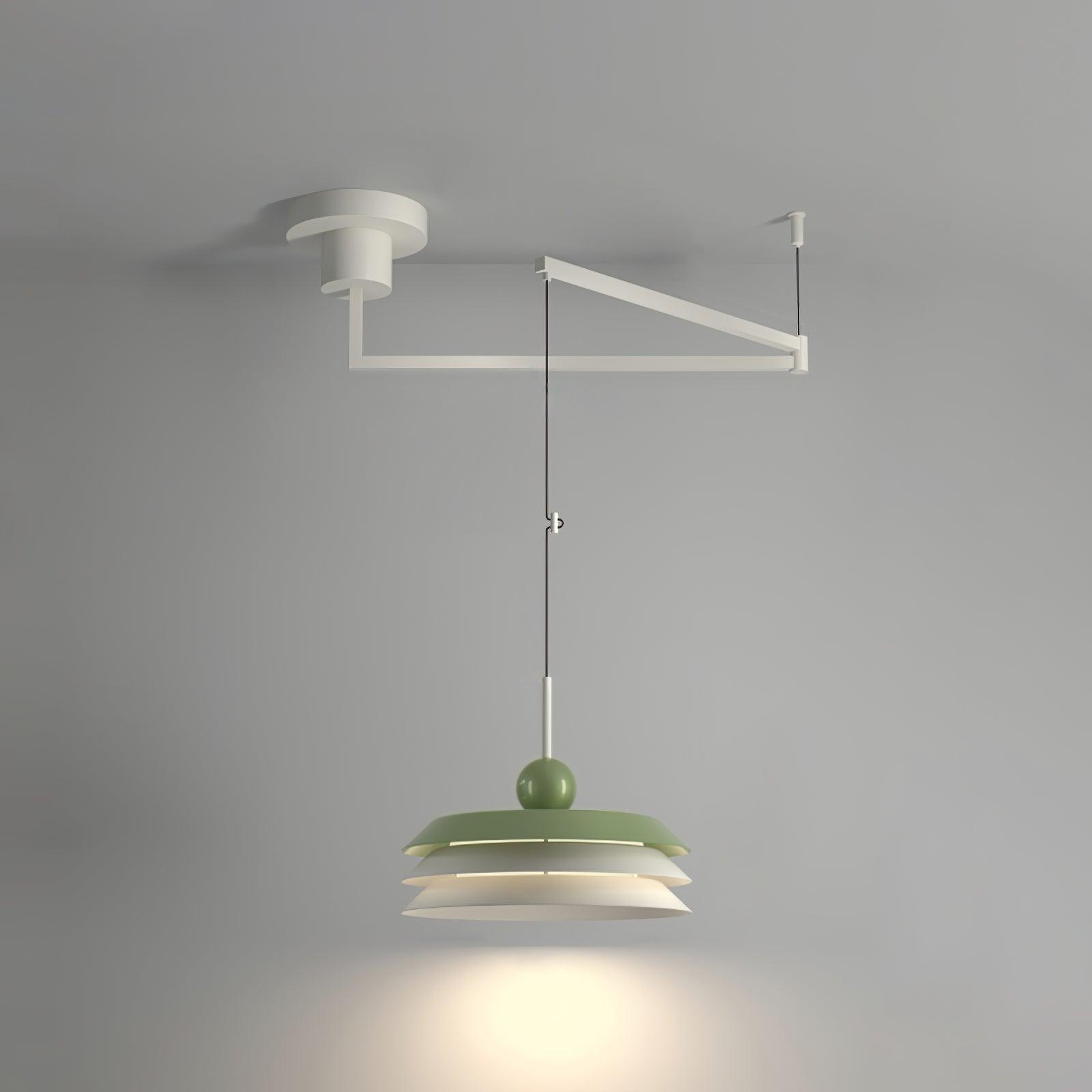 Green-top three-tier Morandi pendant suspended from a white ceiling swing arm