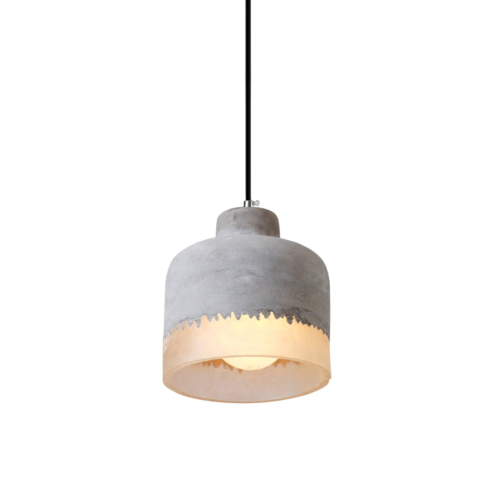 Rounded grey pendant shade with an irregular boundary above a glowing lower band