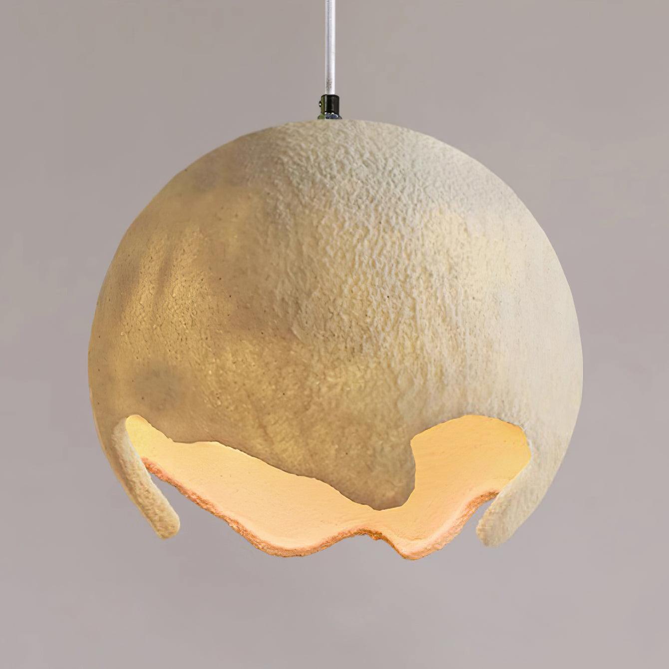Close-up of a lit beige textured globe