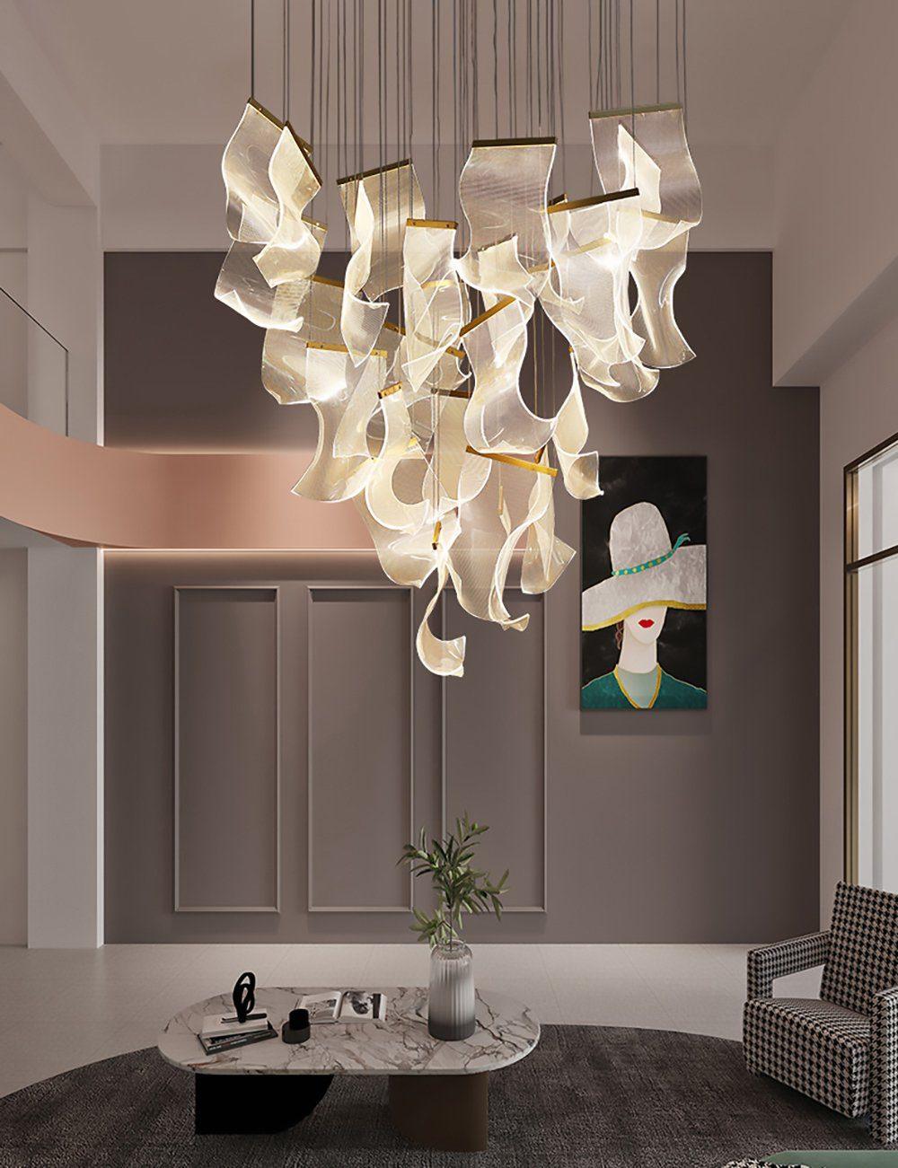 Glowing acrylic chandelier in a tall living space