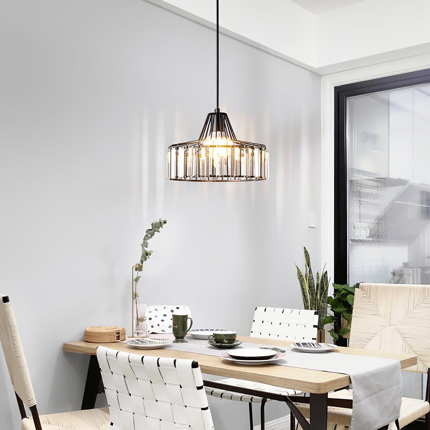 Black crystal-glass pendant beside a large window
