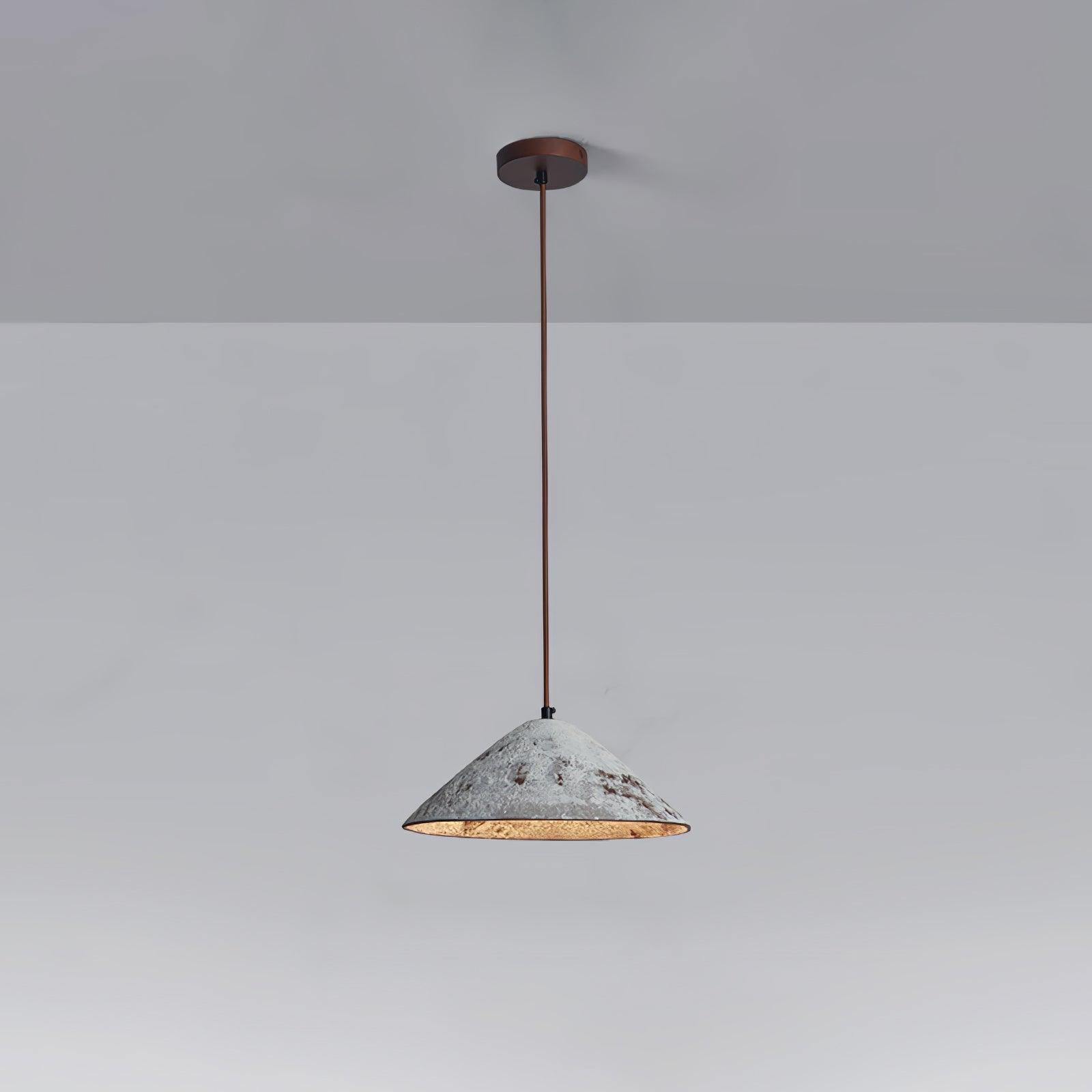 White ceramic cone pendant on a long brown cord from a round dark-brown canopy, against a grey background