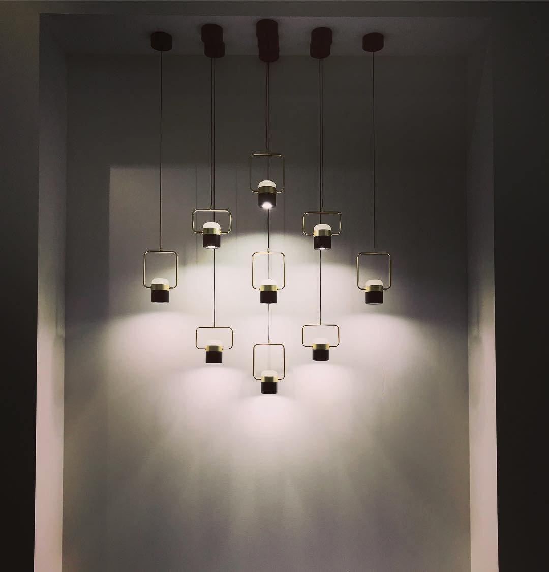 Adjustable LED pendant light with an open geometric frame