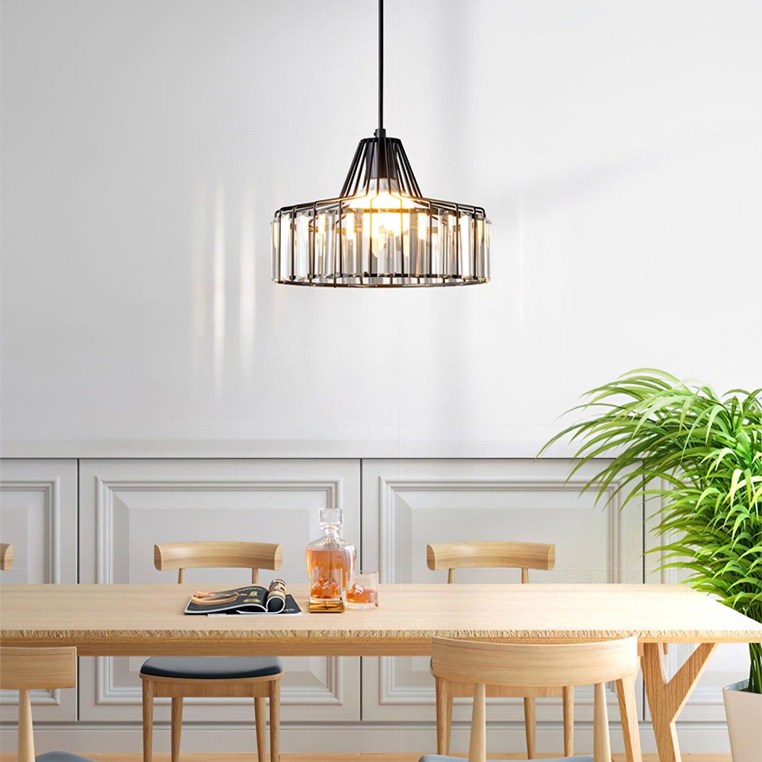 Black crystal-glass pendant above a pale dining table