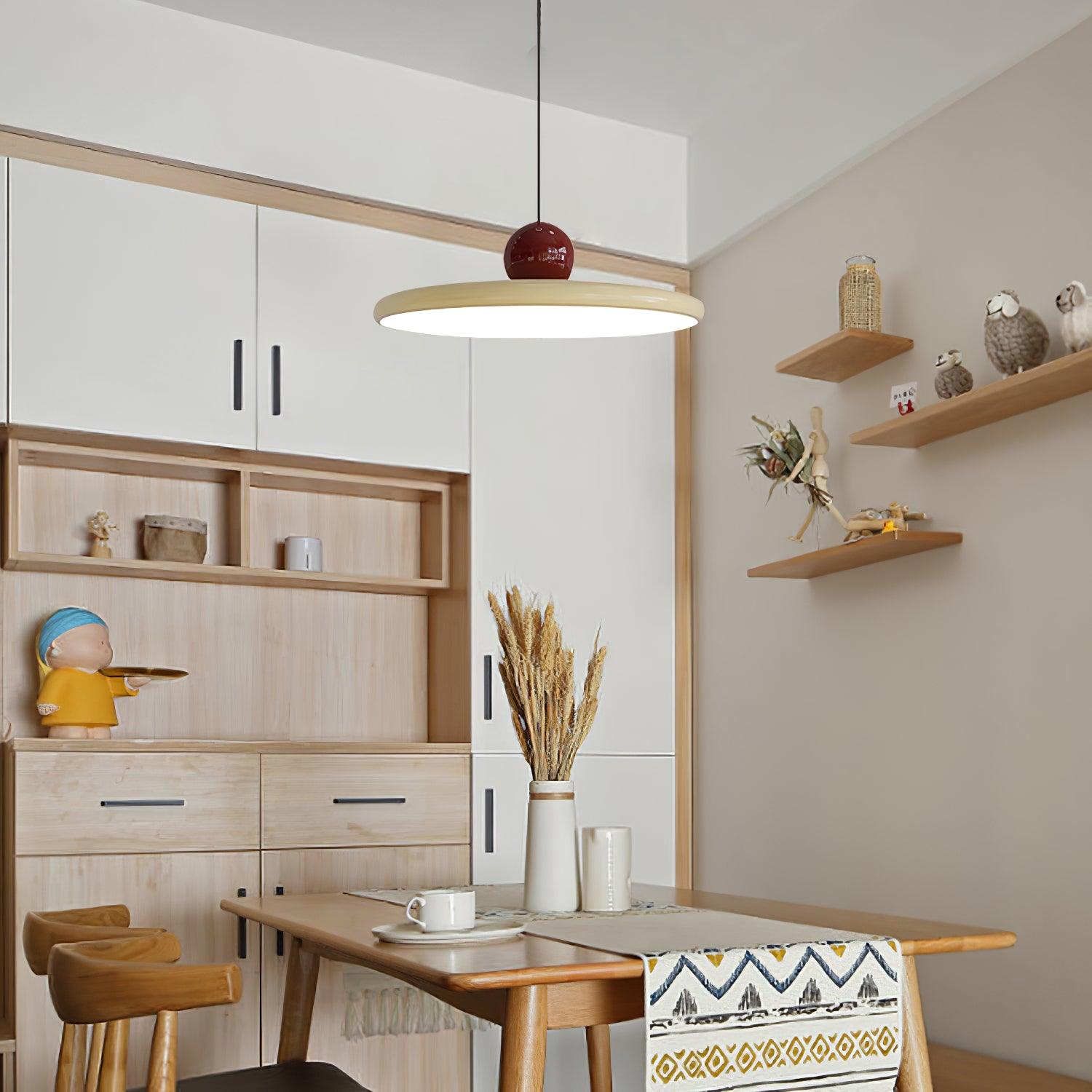 Beige-rimmed Lola pendant in a kitchen with open shelves