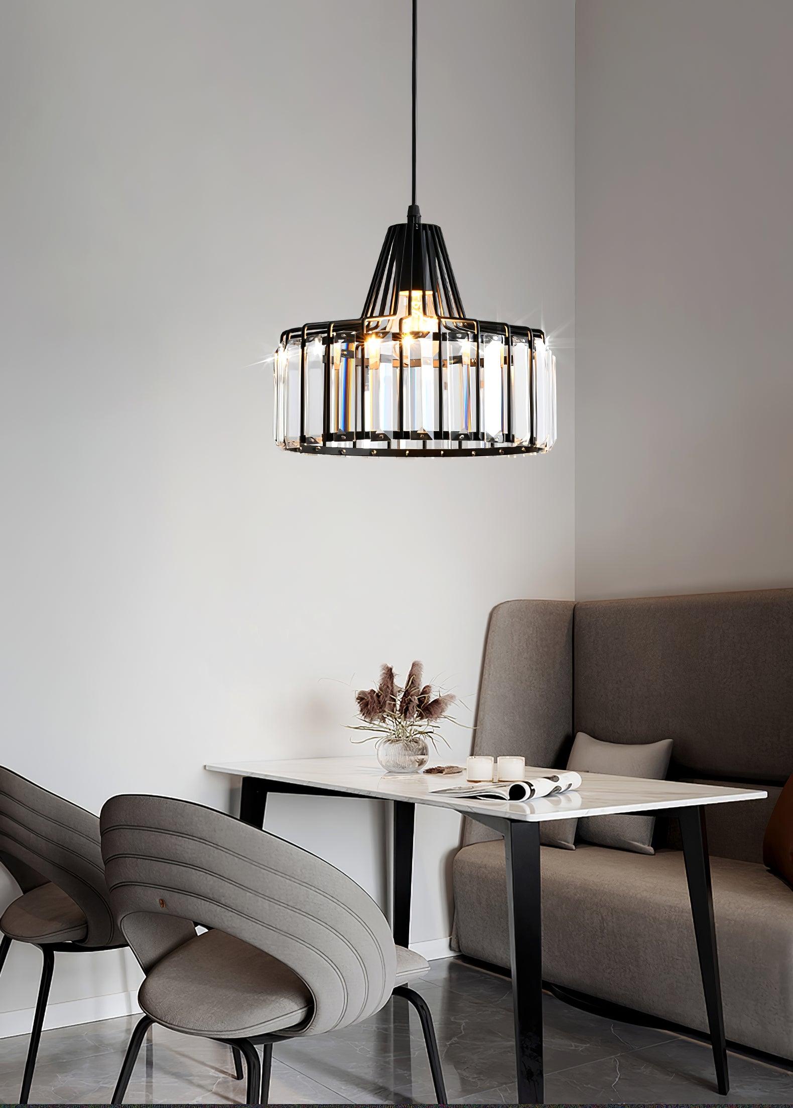 Single drum pendant above a small dining corner