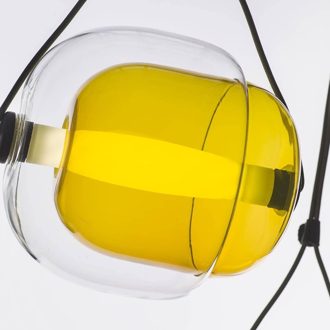 Yellow inner glass inside a clear outer shell
