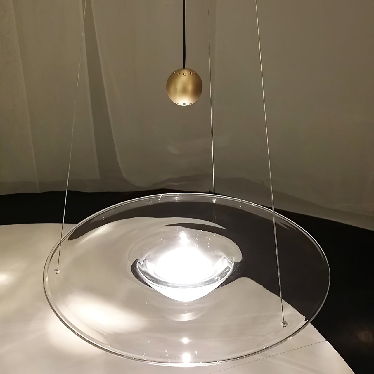 Glass disc with illuminated rounded centre close-up