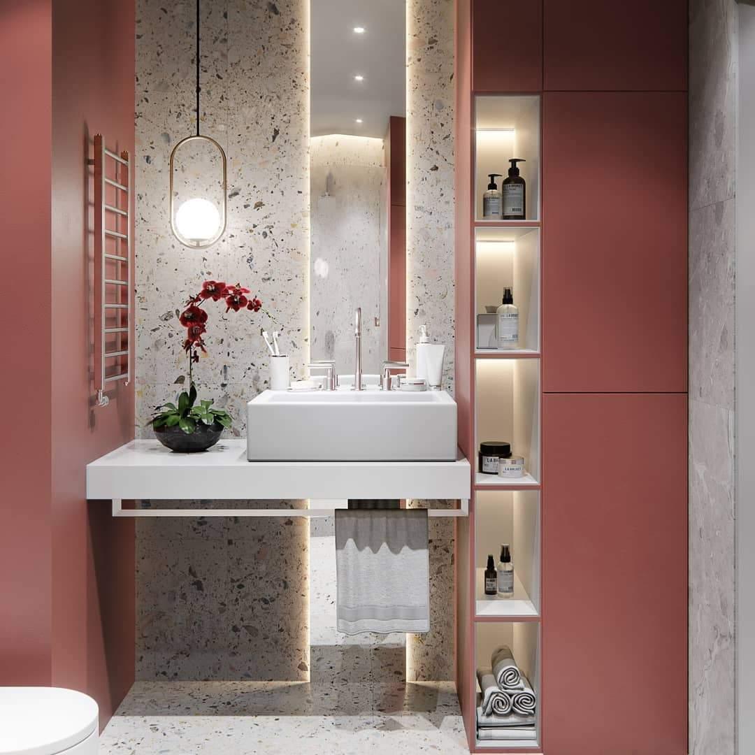 Round frame globe pendant beside a washbasin in a room scene