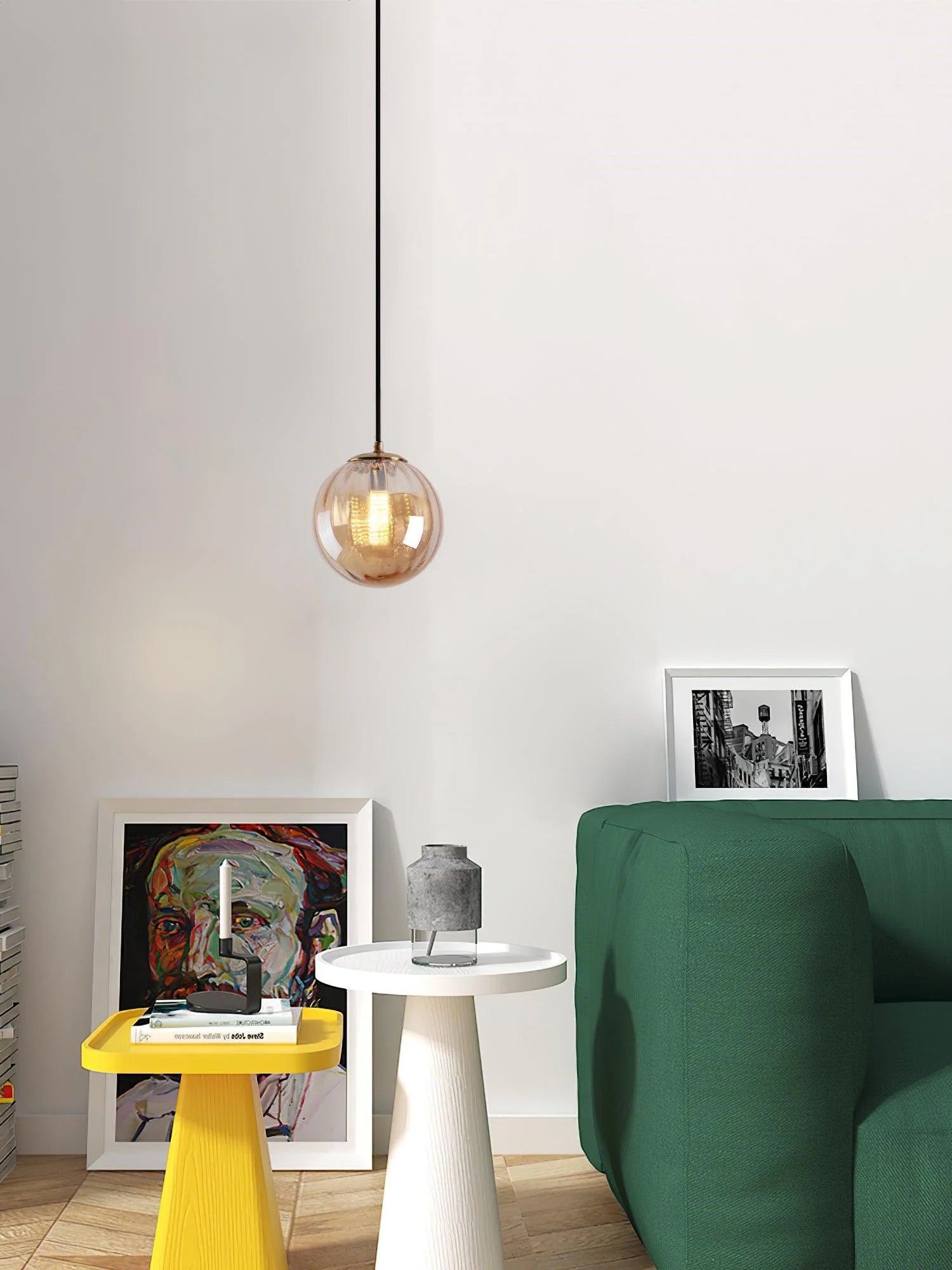 Paola pendant light with a coloured glass globe and small metal cap