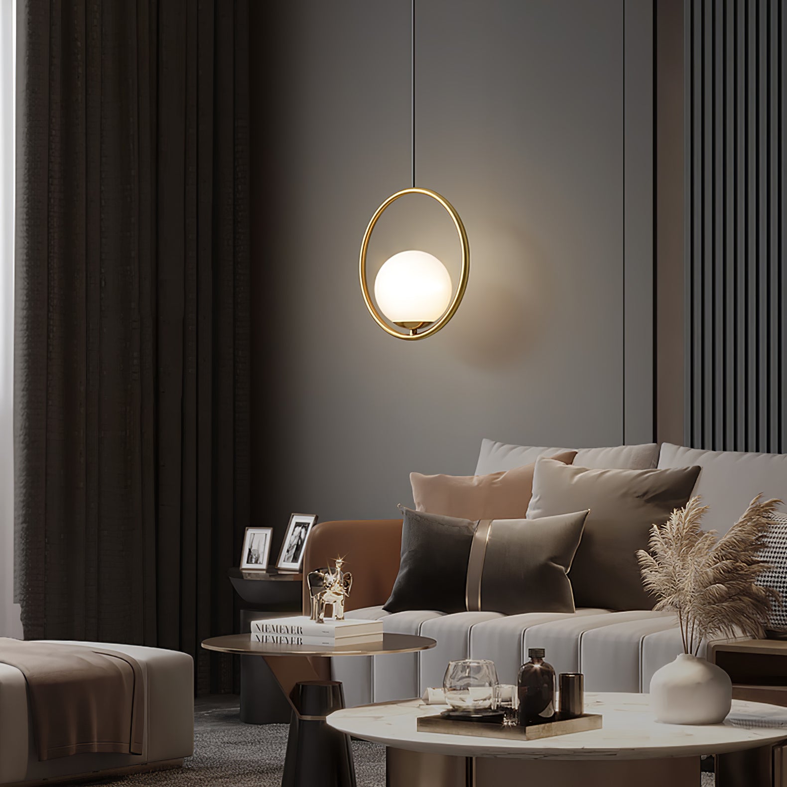 Round frame pendant above a seating area