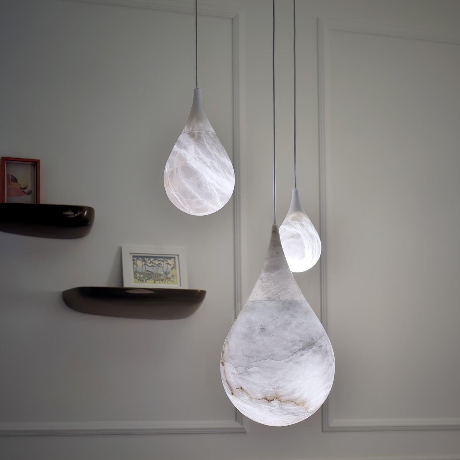 Marble droplet lights hanging at different heights