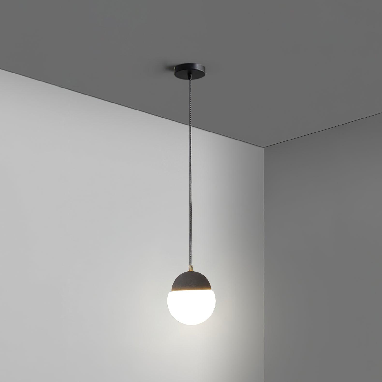 Single globe pendant on a long cable