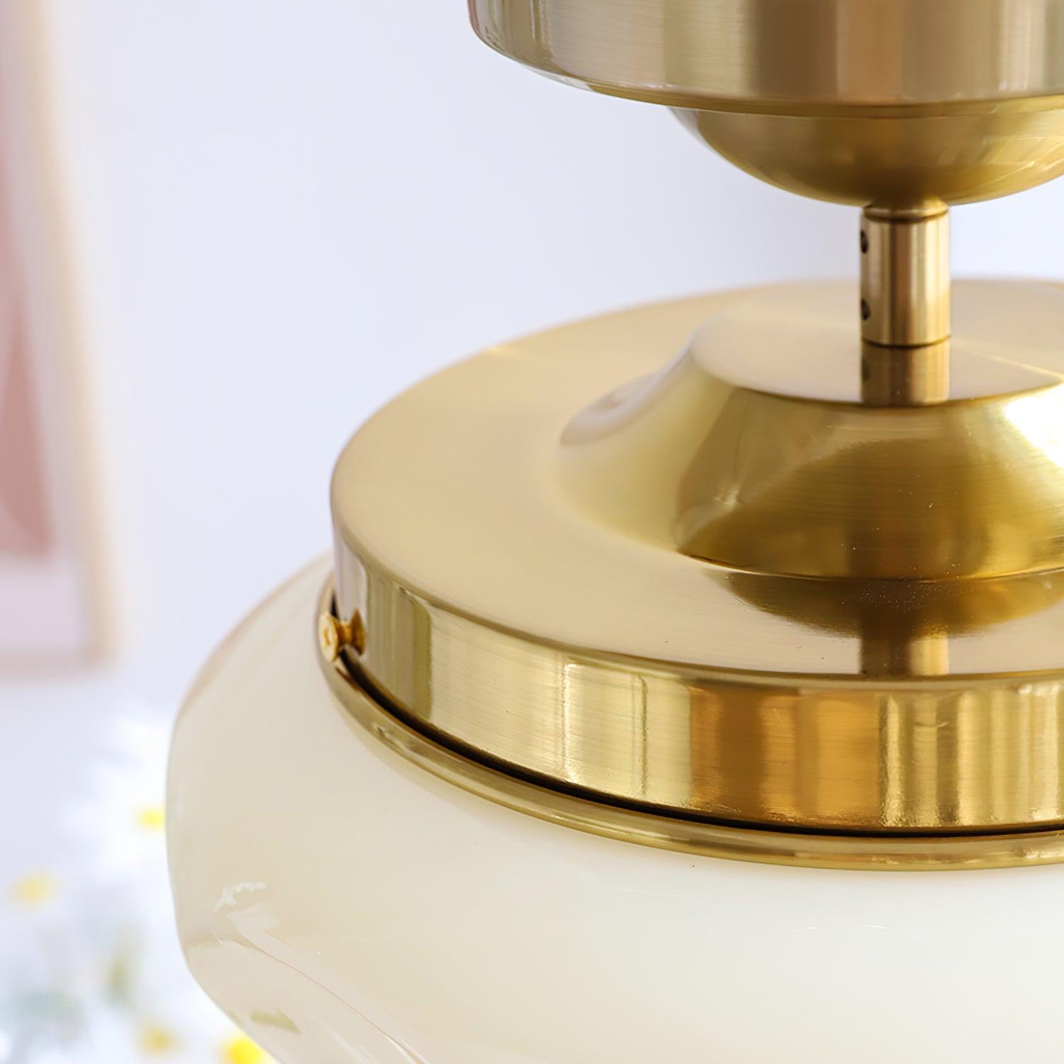 Close view of Gold cap, short neck and ceiling canopy