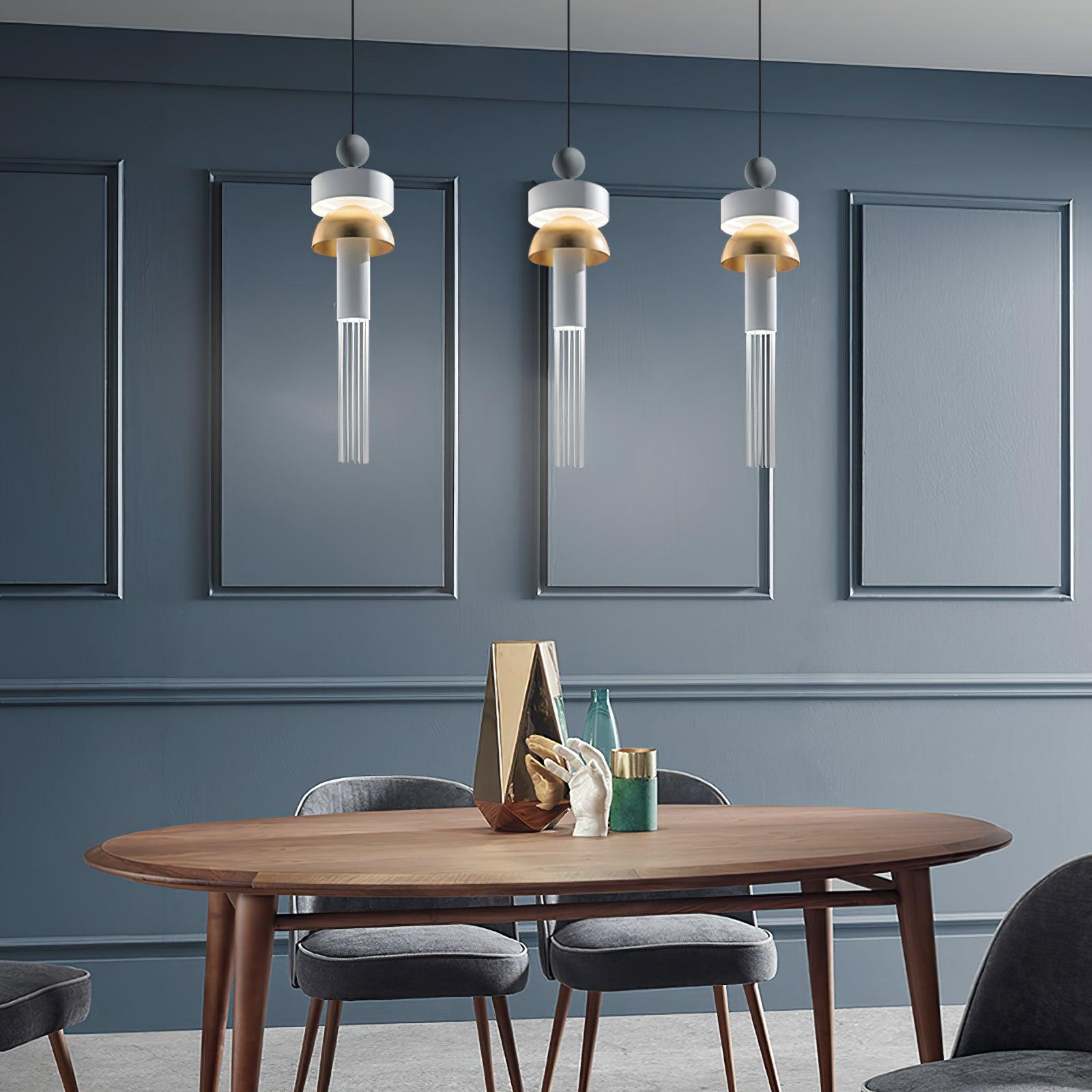 Three Style B tassel pendants above a dining table