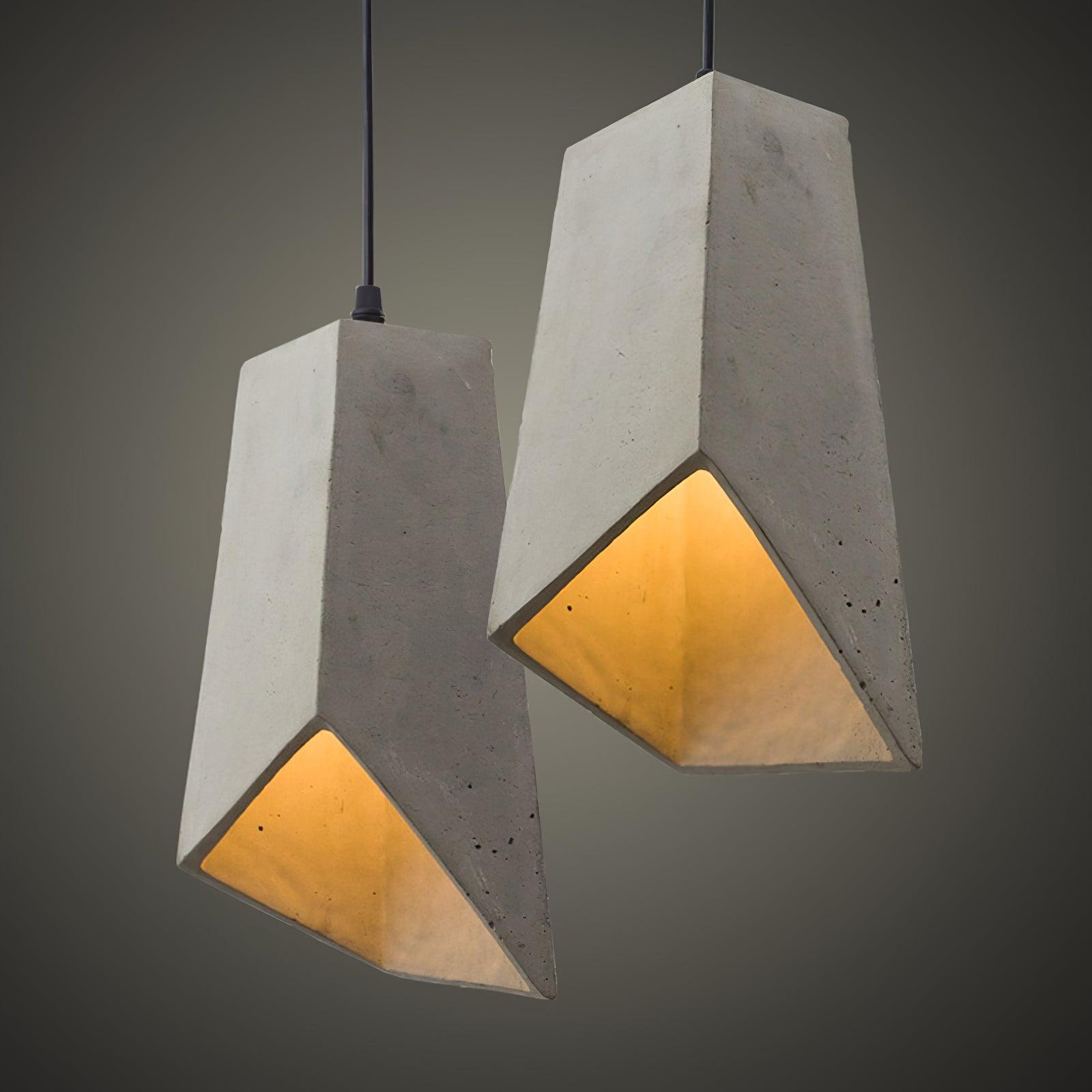 Two angular cement pendants with angled openings