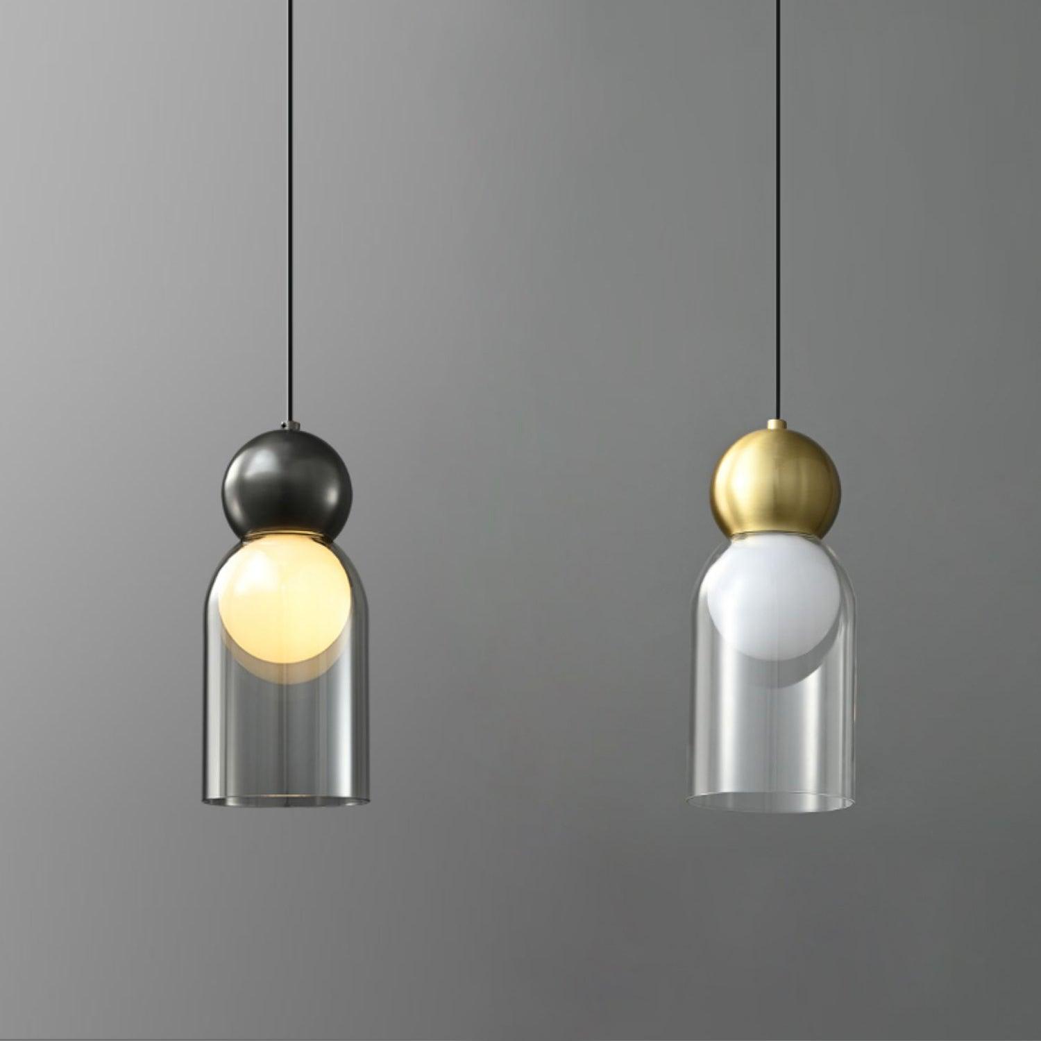 Black and Brass Dani cylinder pendants shown together