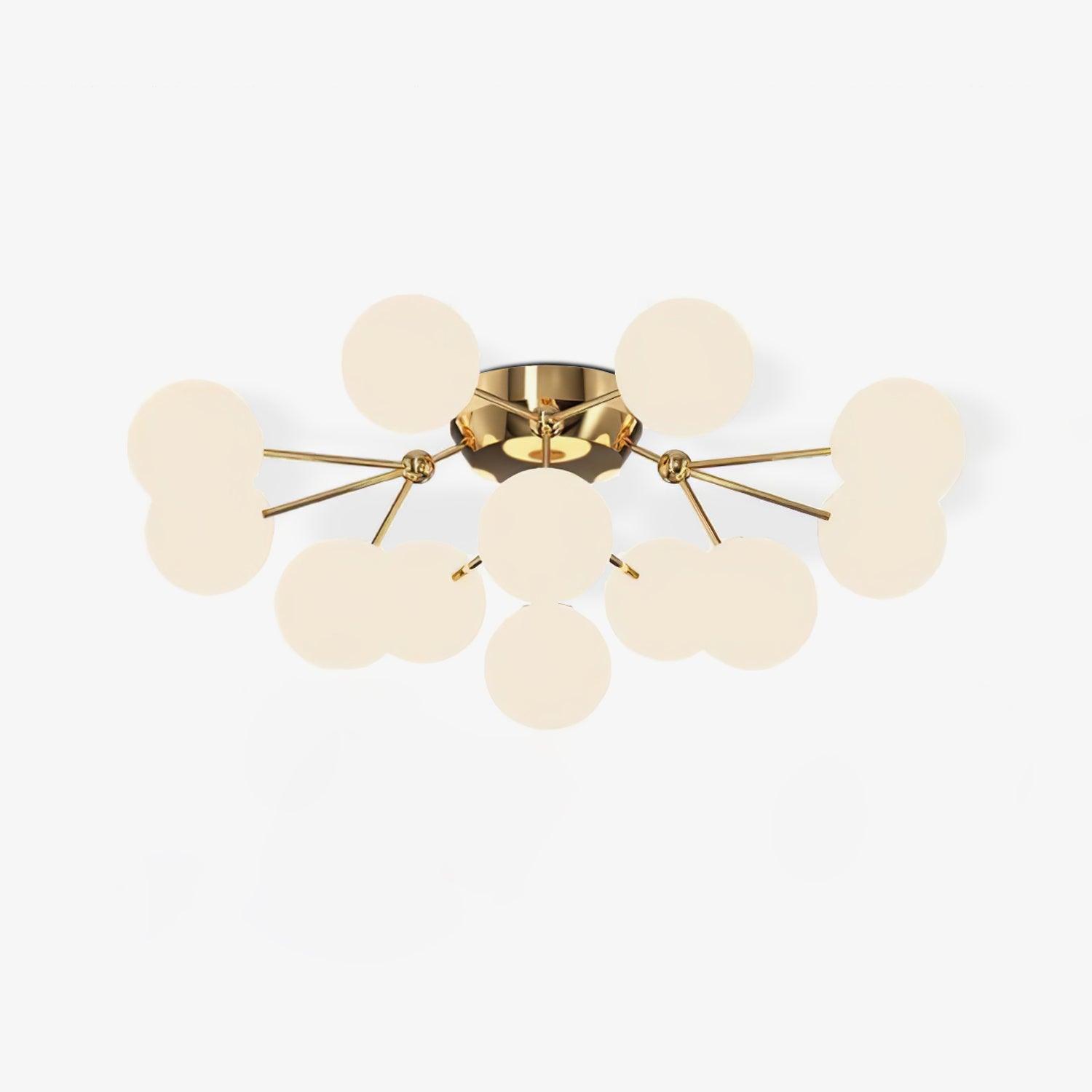 Gold branching ceiling light with warm-looking white glass globes and shallow round canopy, shown on white