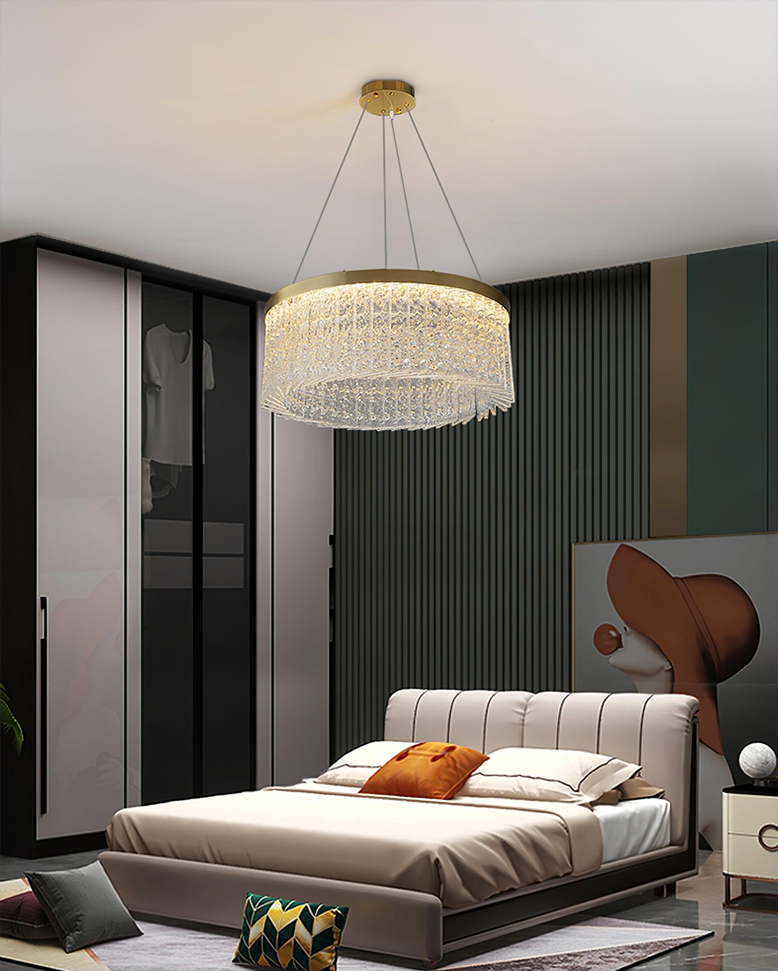 Crystal ring above cream bed with orange pillow, glass wardrobe, dark ribbed wall and orange-hat portrait