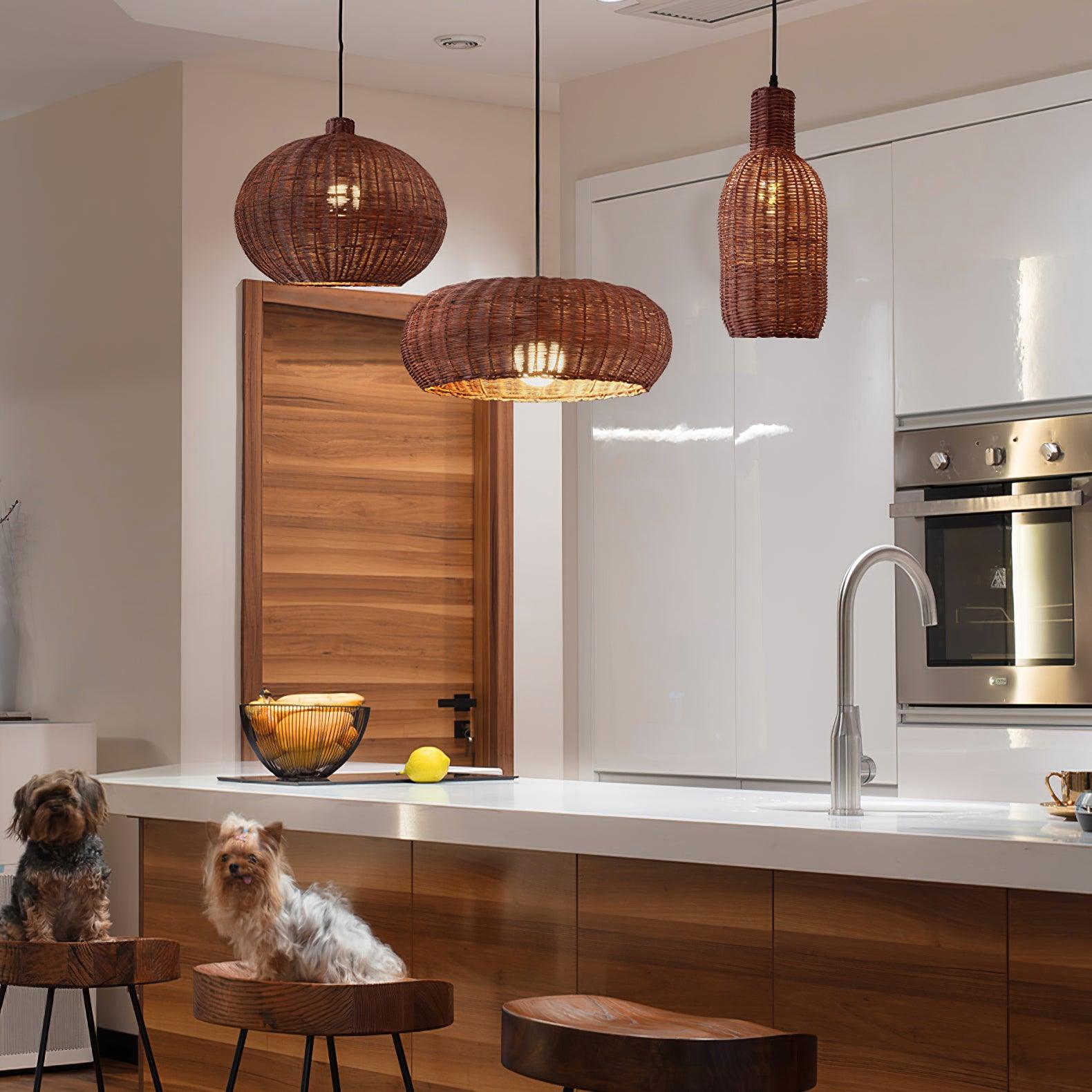 Three brown woven pendant shapes above a kitchen island